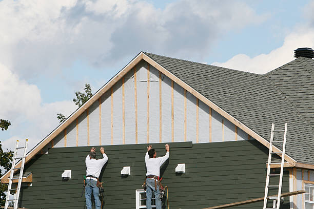 Professional Storm Damage Siding Repair technician working in Hickory, PA
